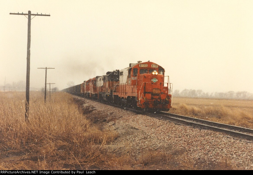 Loaded coal train rolls east